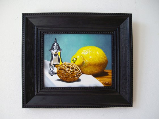 Lemon and walnut in silver