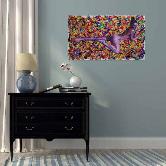 Nude woman painting with candy background