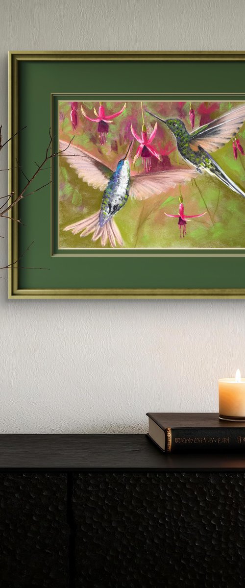 Hummingbirds in flight by Yuliia Sharapova