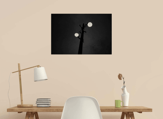 two lightbulbs in the darkness