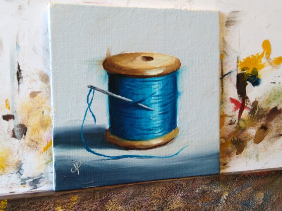 Little blue  cotton reel still life