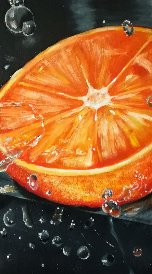 Orange splash by Nataliia Plakhotnyk