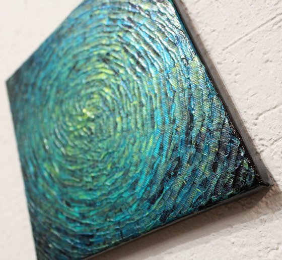 Small iridescent blue green shine