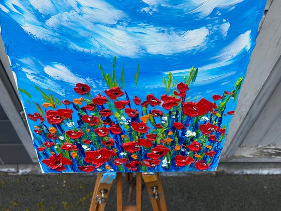 Red poppies at the meadow