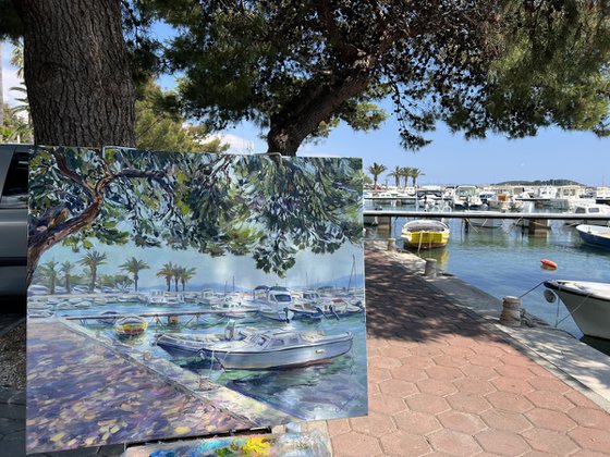 Ships under pine trees