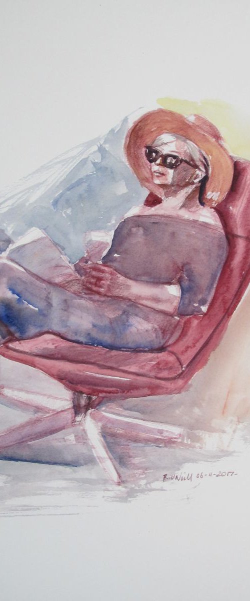 seated woman reading by Rory O’Neill