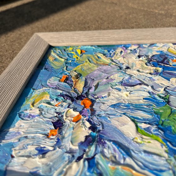 Irises in a blue dress