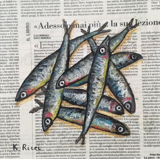 Mixed Anchovies on Newspaper