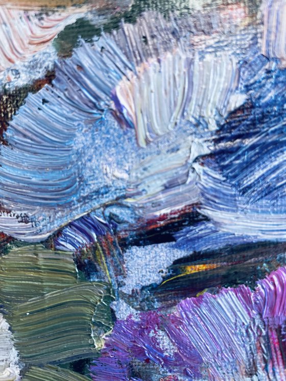 A lush bouquet in a pink vase