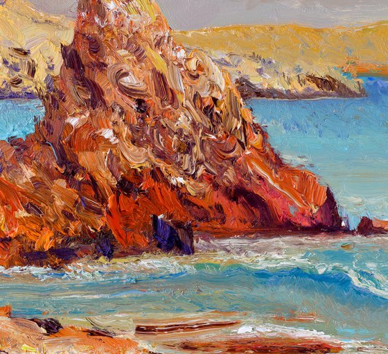 Red Rocks on Pacific Ocean