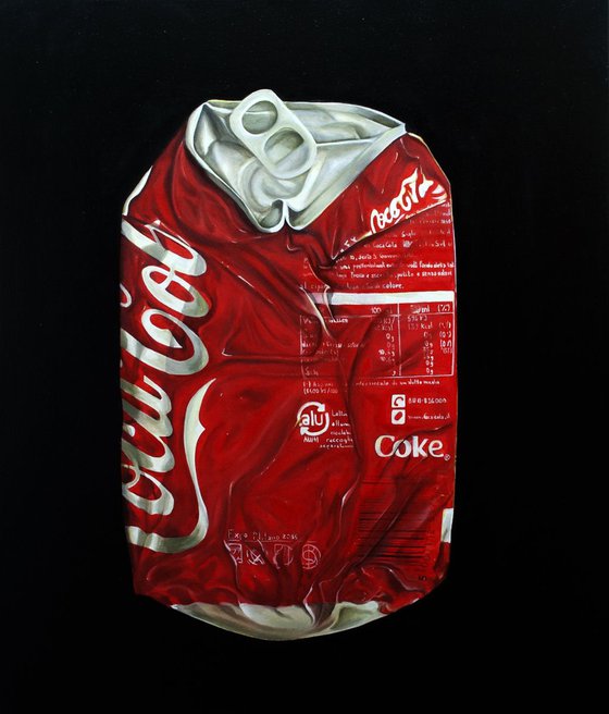 Coca Cola can crushed