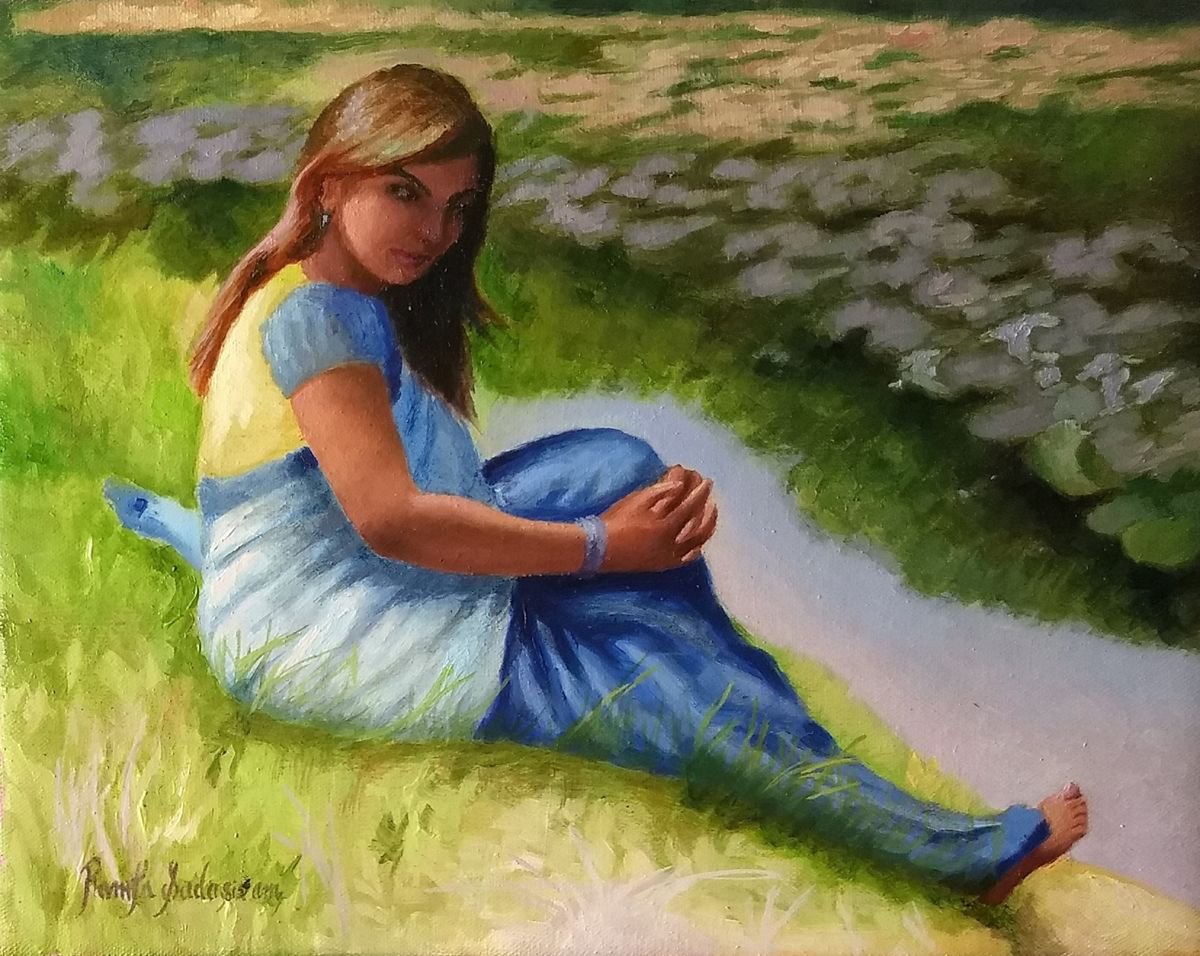 Woman near pond by Ramya Sadasivam