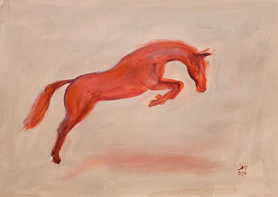 Jumping orange horse
