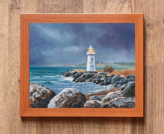Lighthouse in blue-gray sky