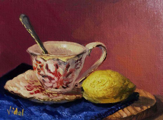 Tea cup and lemon - still life