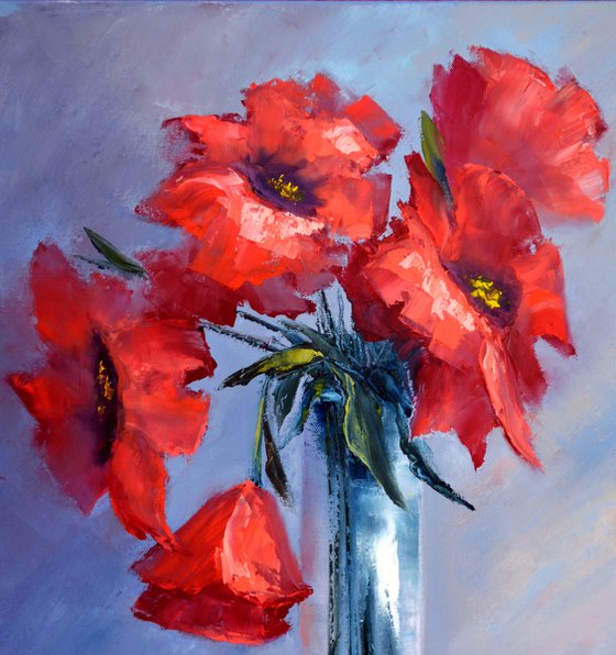 Red poppies on blue