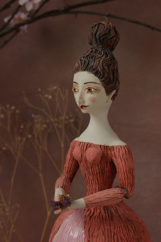 Beautiful Dame with Twirled Updo in Red & White Dress.  Wall sculpture by Elya Yalonetski