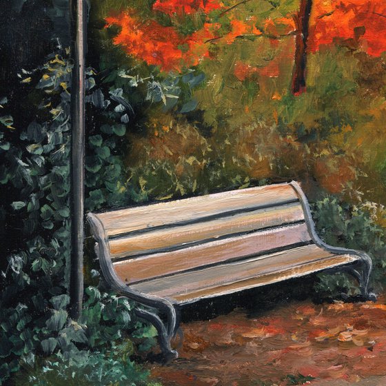 Bench and streetlight in the park