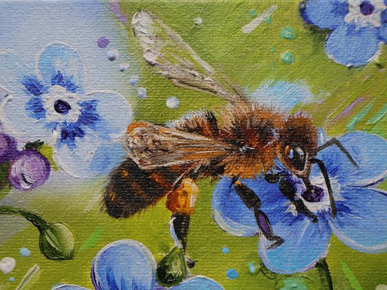 Bee Among Blue Blossoms