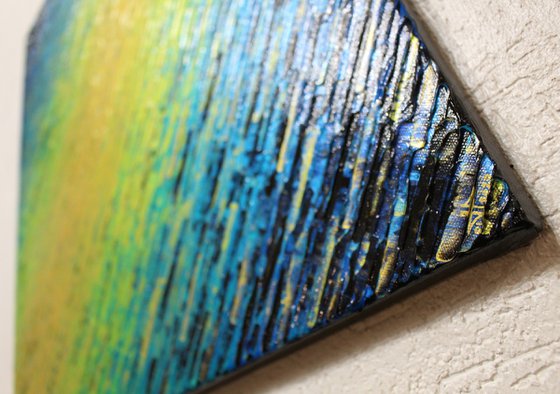 Iridescent gold green blue knife texture
