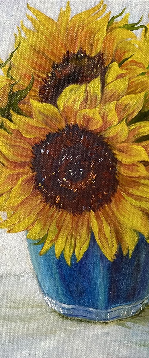 Sunflowers in a Blue Vase by Elena