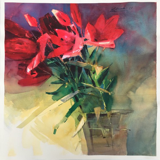 Red lilies in a vase