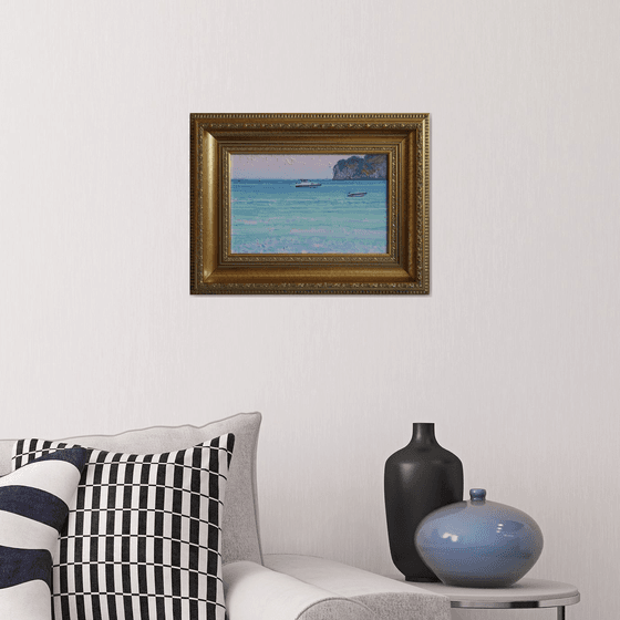 Sunset. Boats on the sea