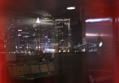Reflections of Manhattan at night by Louise O'Gorman