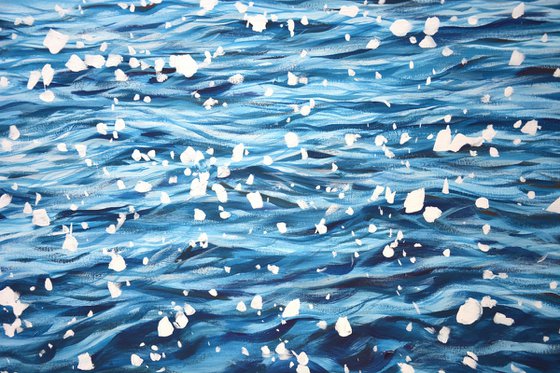 Glare on blue water.