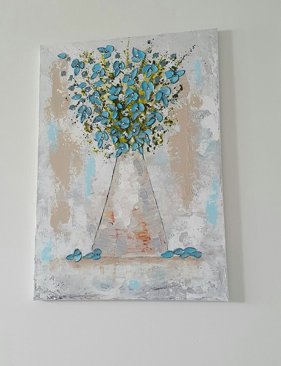 VASE WITH TEAL FLOWERS