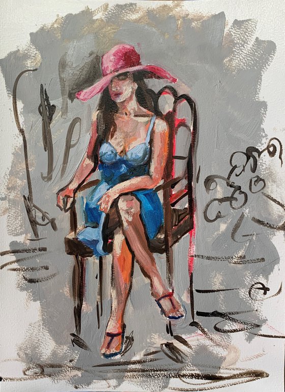 Woman sitting on the chair.