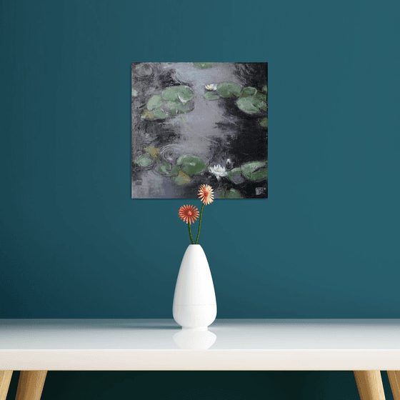 Whisper of white water lilies.