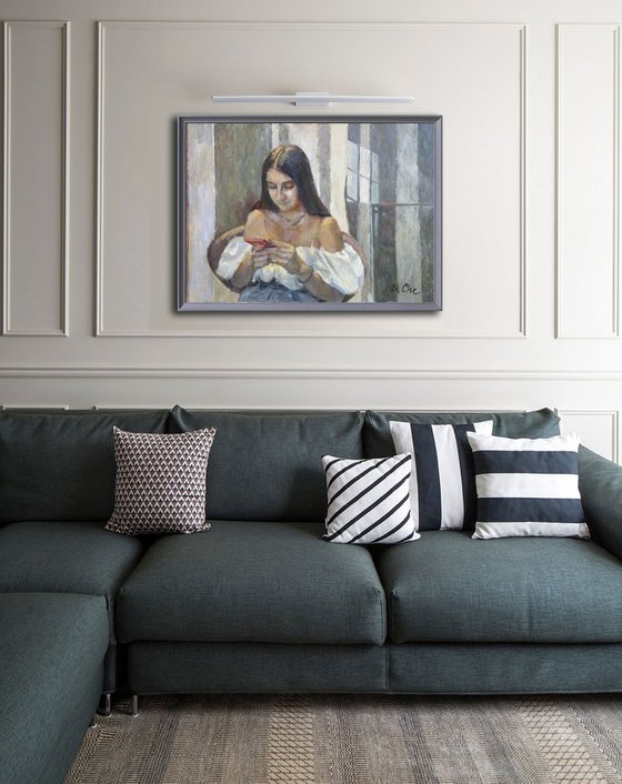 A girl reading a letter