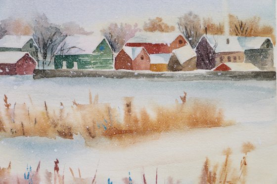 Winter village landscape with houses.