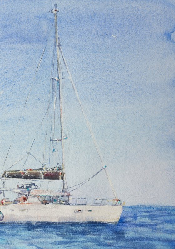 White yacht on the blue sea
