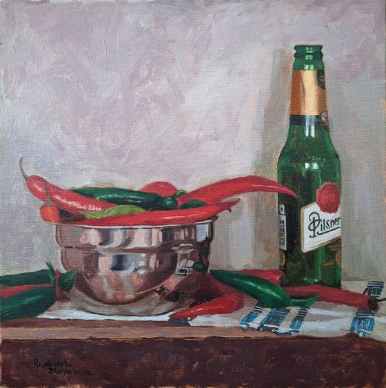 A bottle and chili peppers