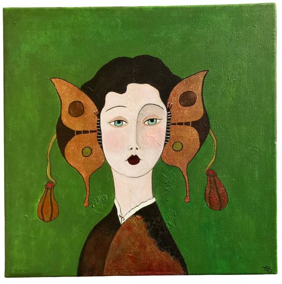 Woman with golden butterflies