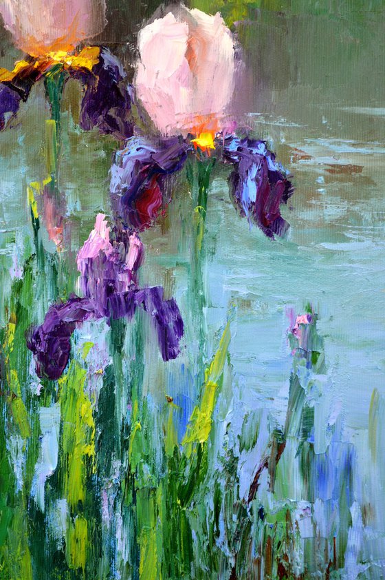 Three Irises by the pond