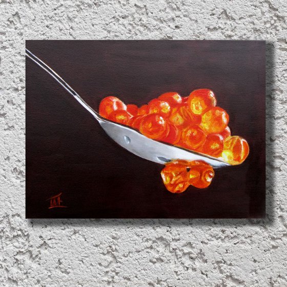 Red caviar in the spoon. Still life