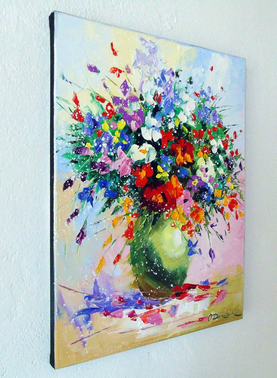 A bouquet of meadow flowers in a vase