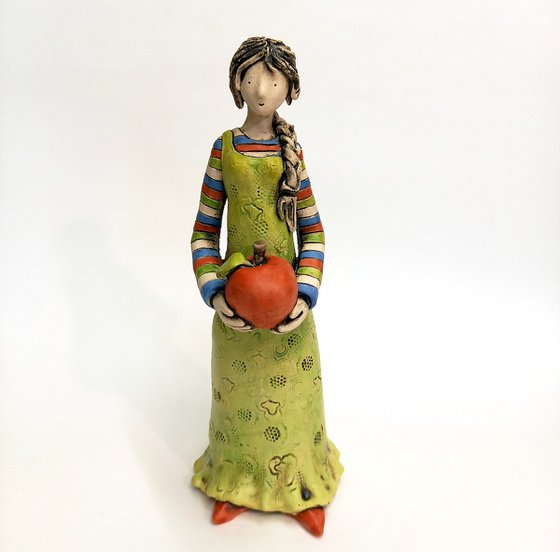 The Apple Girl, ceramic sculpture by Izabell Nemechek