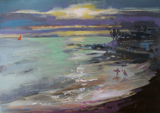Surfing at sunset