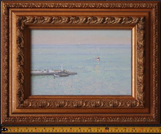 Sunset. The sea is calm. Bali. Crete. Greece