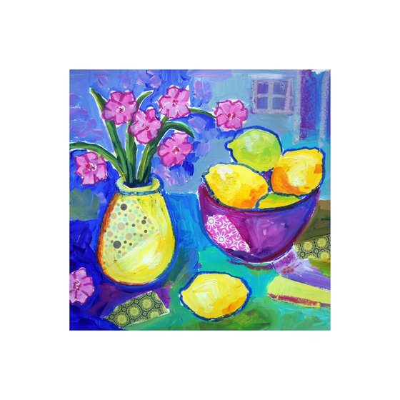 Lemons in a purple bowl