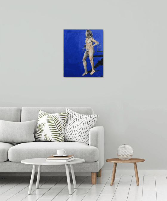 Young nude man in blue room