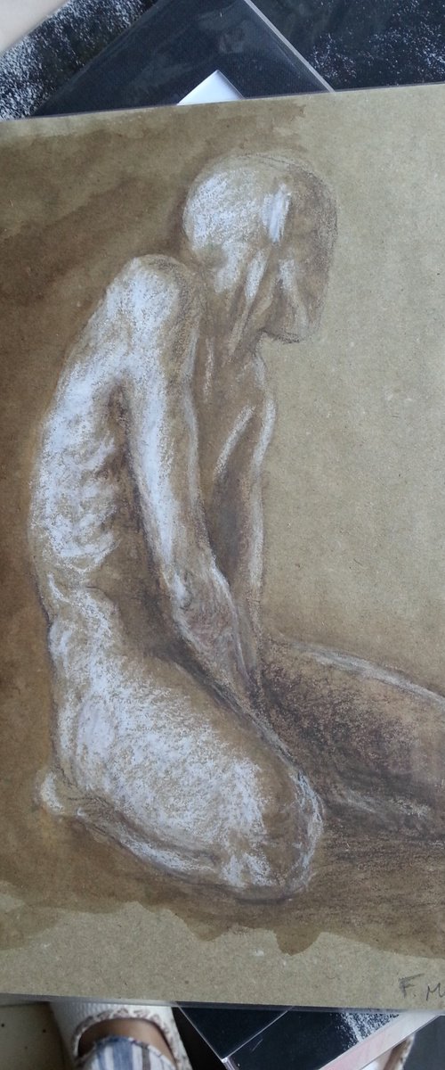Man kneeling by Fabienne Monestier
