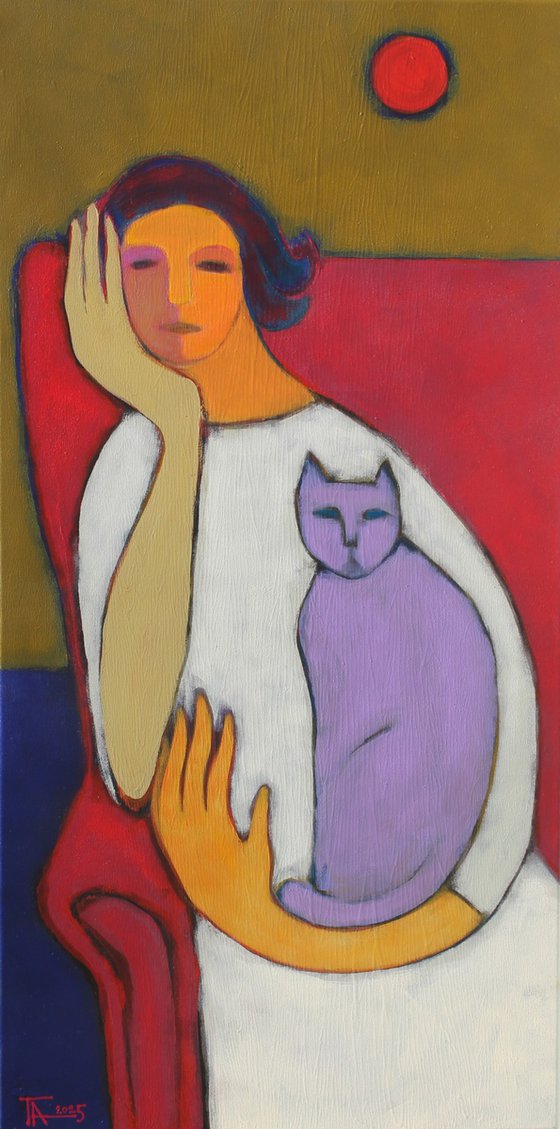 Portrait in a red chair.