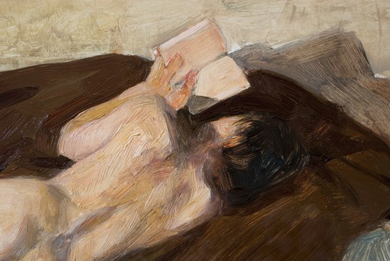 nude woman reading