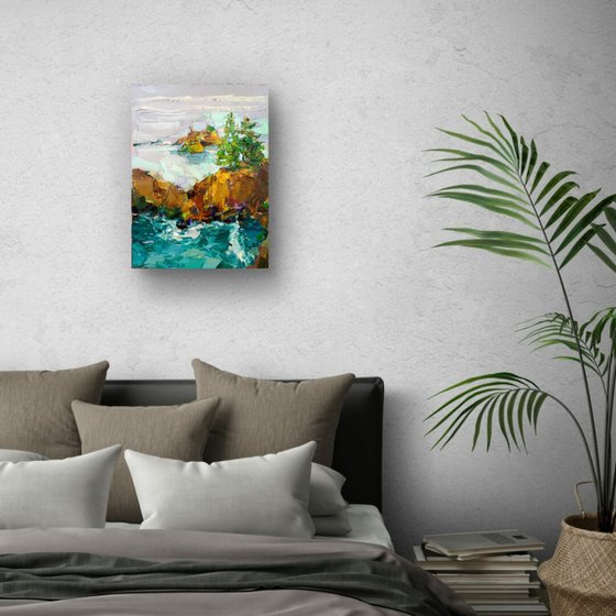 AT THE EDGE OF THE SEA