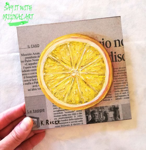 "Lemon on Newspaper"